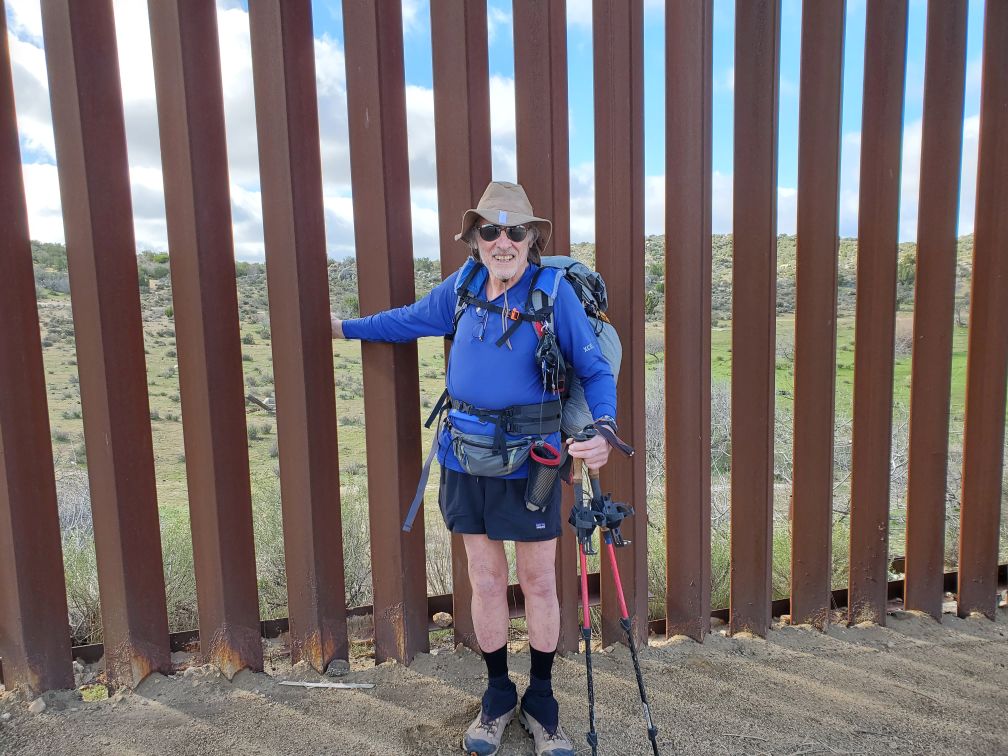 Yeti at Mexican Border with hand thru the wall