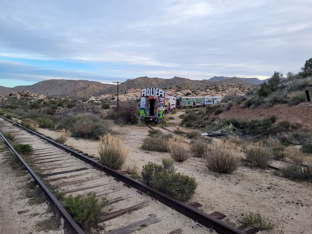 Old cars off on siding